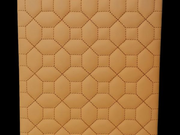 pannello campione beige con cuciture beige che riproducono ottagoni